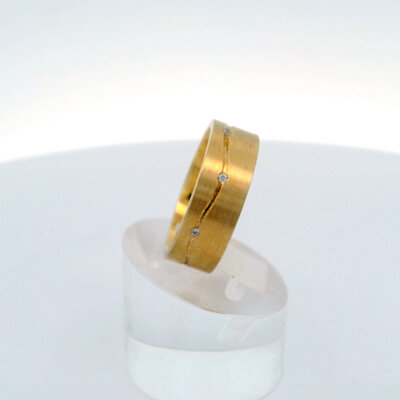 Welle mit Steinbesatz 